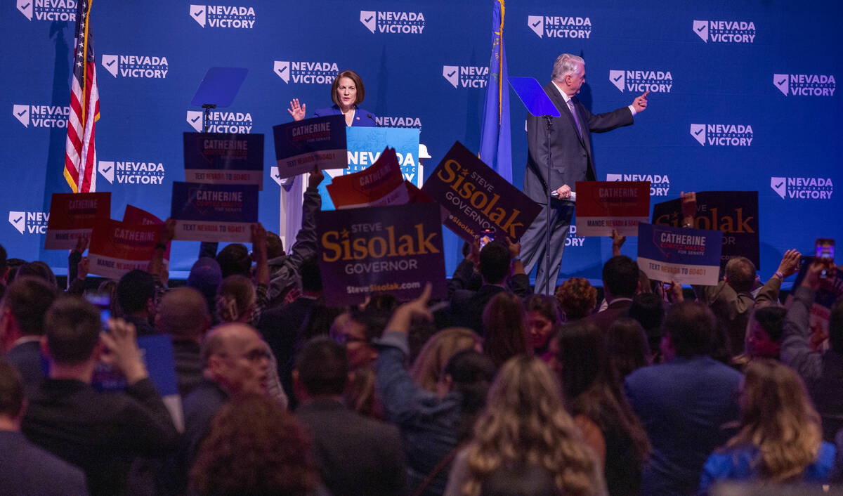 Senator Catherine Cortez Masto with Governor Steve Sisolak greet supporters before speaking dur ...