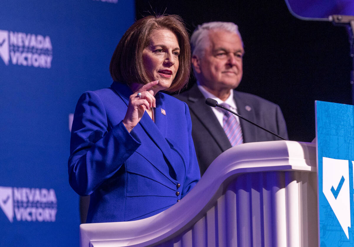 Senator Catherine Cortez Masto speaks beside Governor Steve Sisolak during the Nevada Democrati ...