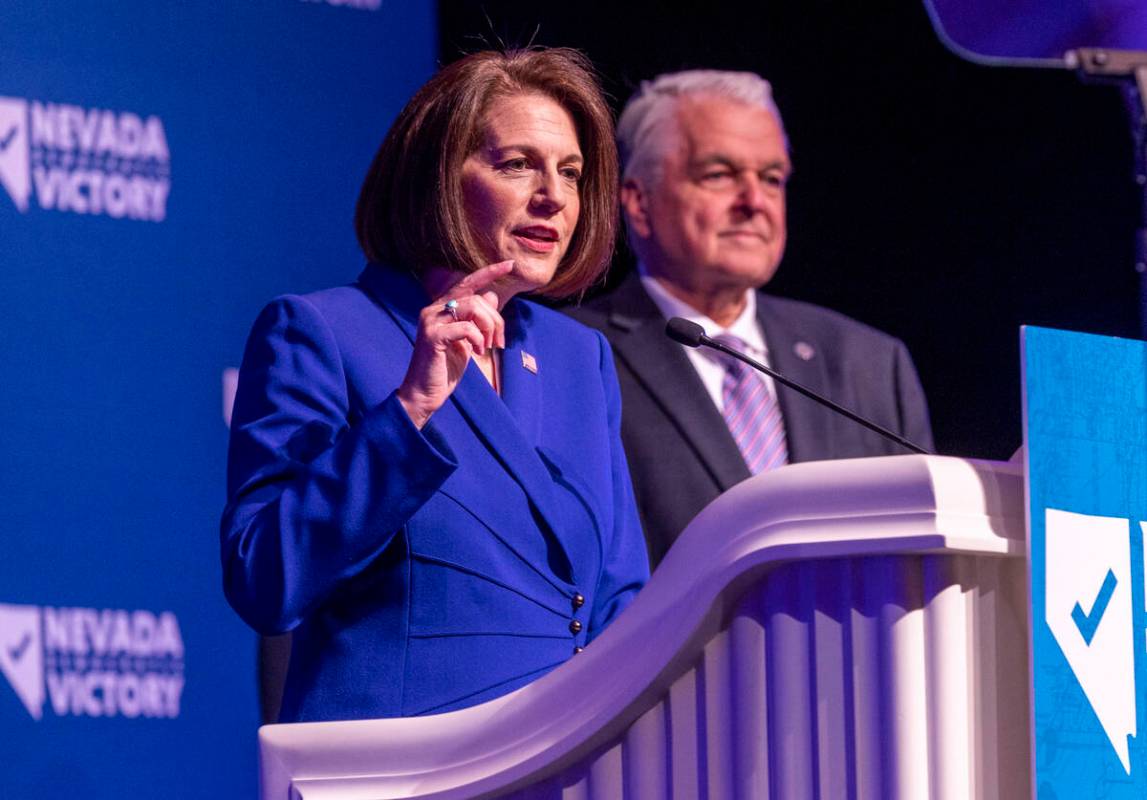 Senator Catherine Cortez Masto speaks beside Governor Steve Sisolak during the Nevada Democrati ...
