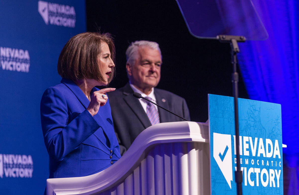 Senator Catherine Cortez Masto speaks beside Governor Steve Sisolak during the Nevada Democrati ...