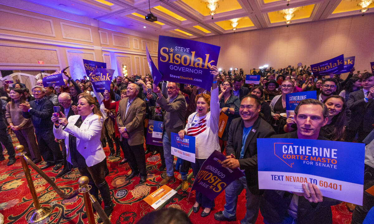Supporters cheer as Senator Catherine Cortez Masto and Governor Steve Sisolak speak during the ...