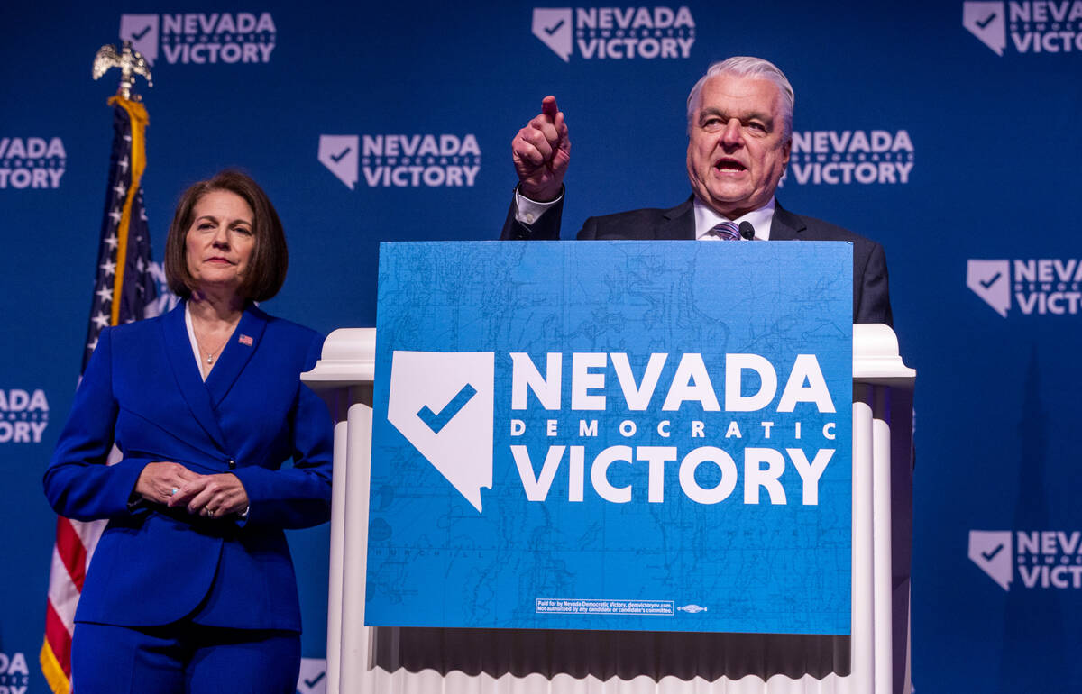Governor Steve Sisolak speaks with Senator Catherine Cortez Masto at his side during the Nevada ...