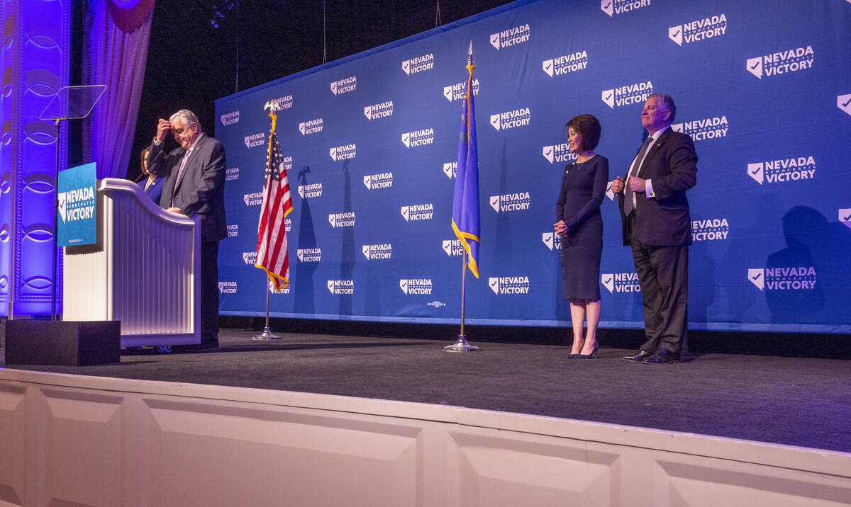 Senator Catherine Cortez Masto stands beside Governor Steve Sisolak while speaking as their spo ...