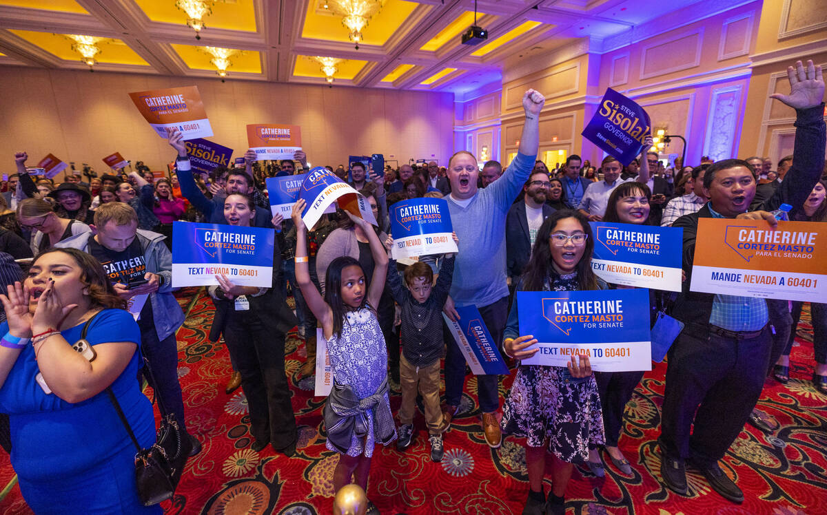 Supporters cheer as Senator Catherine Cortez Masto and Governor Steve Sisolak speak during the ...