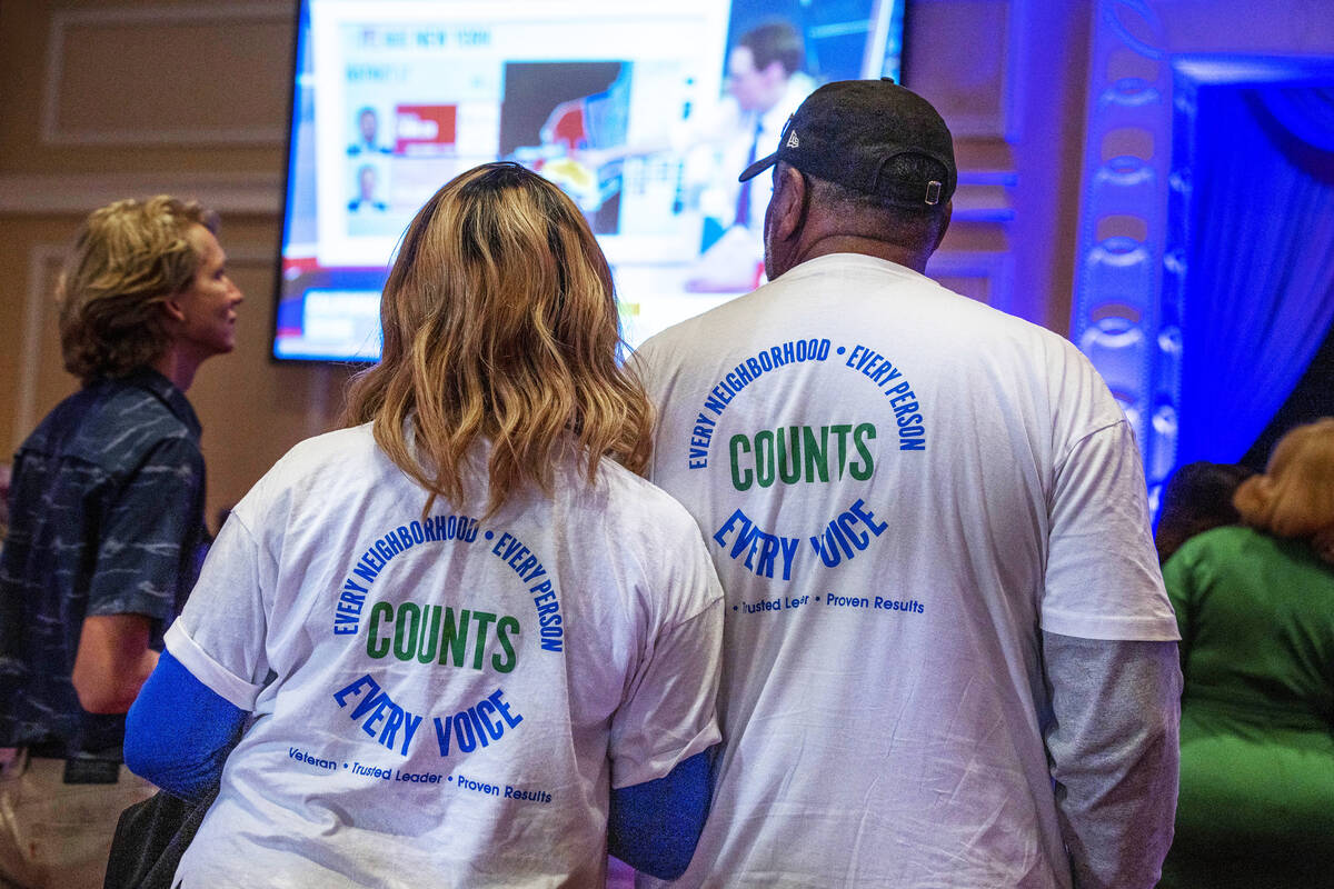 Supporters continue to watch the election results during the Nevada Democratic Victory Election ...