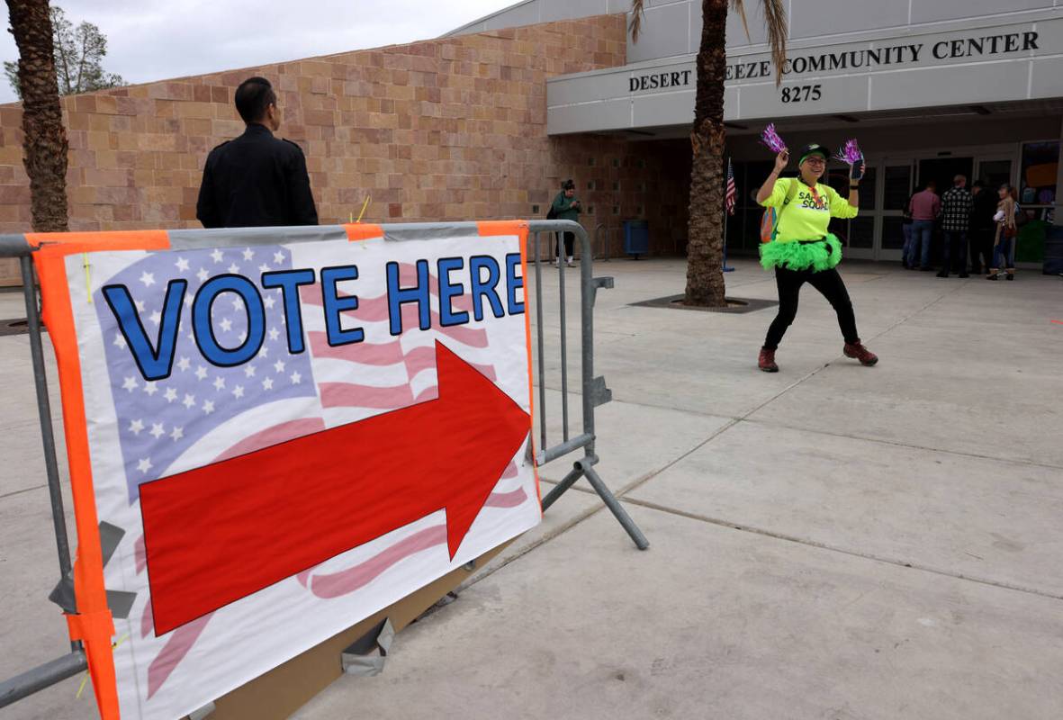 C.G. with Election Defenders nonpartisan poll monitoring group fires up voters waiting in line ...