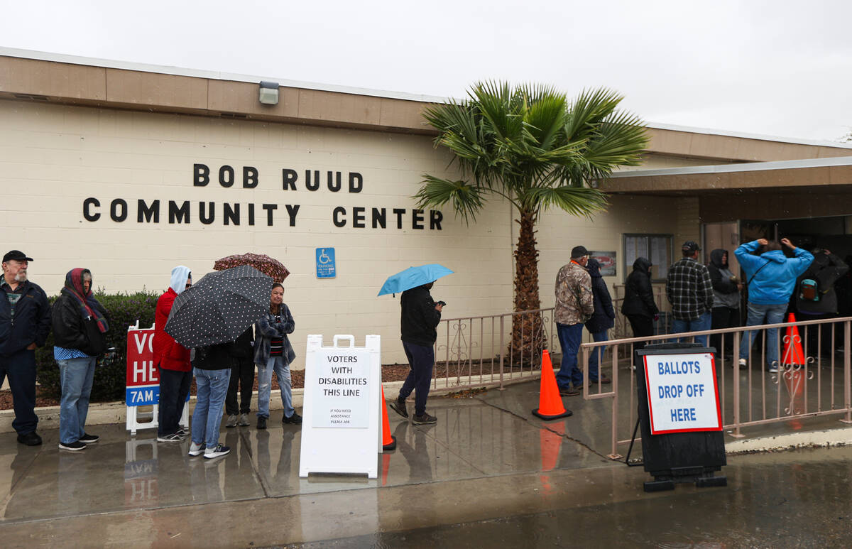 Nye County voters line up to cast their ballots on Election Day at Bob Ruud Community Center in ...