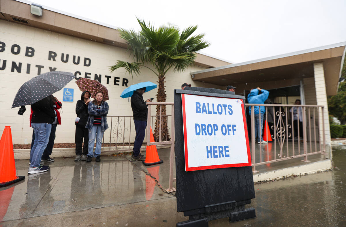 Nye County voters line up to cast their ballots on Election Day at Bob Ruud Community Center in ...