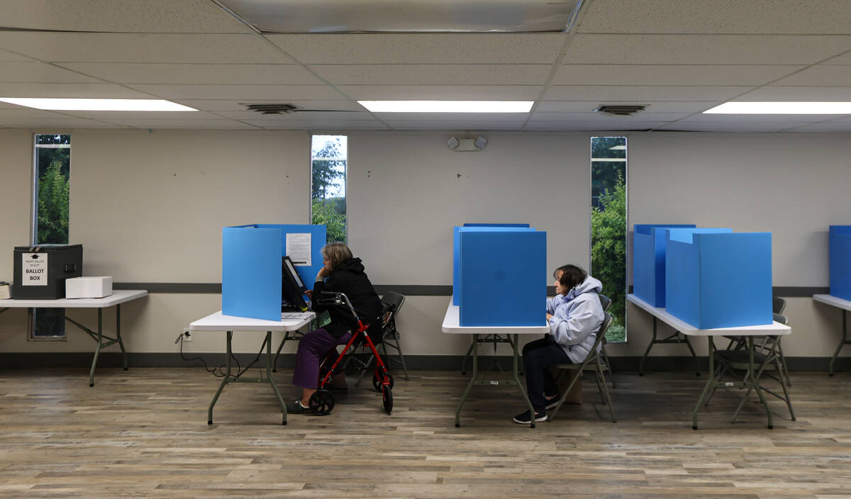 Voters cast provisional ballots on Election Day at Bob Ruud Community Center in Pahrump on Tues ...