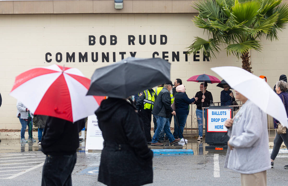Nye County voters line up to cast their ballots on Election Day at Bob Ruud Community Center in ...