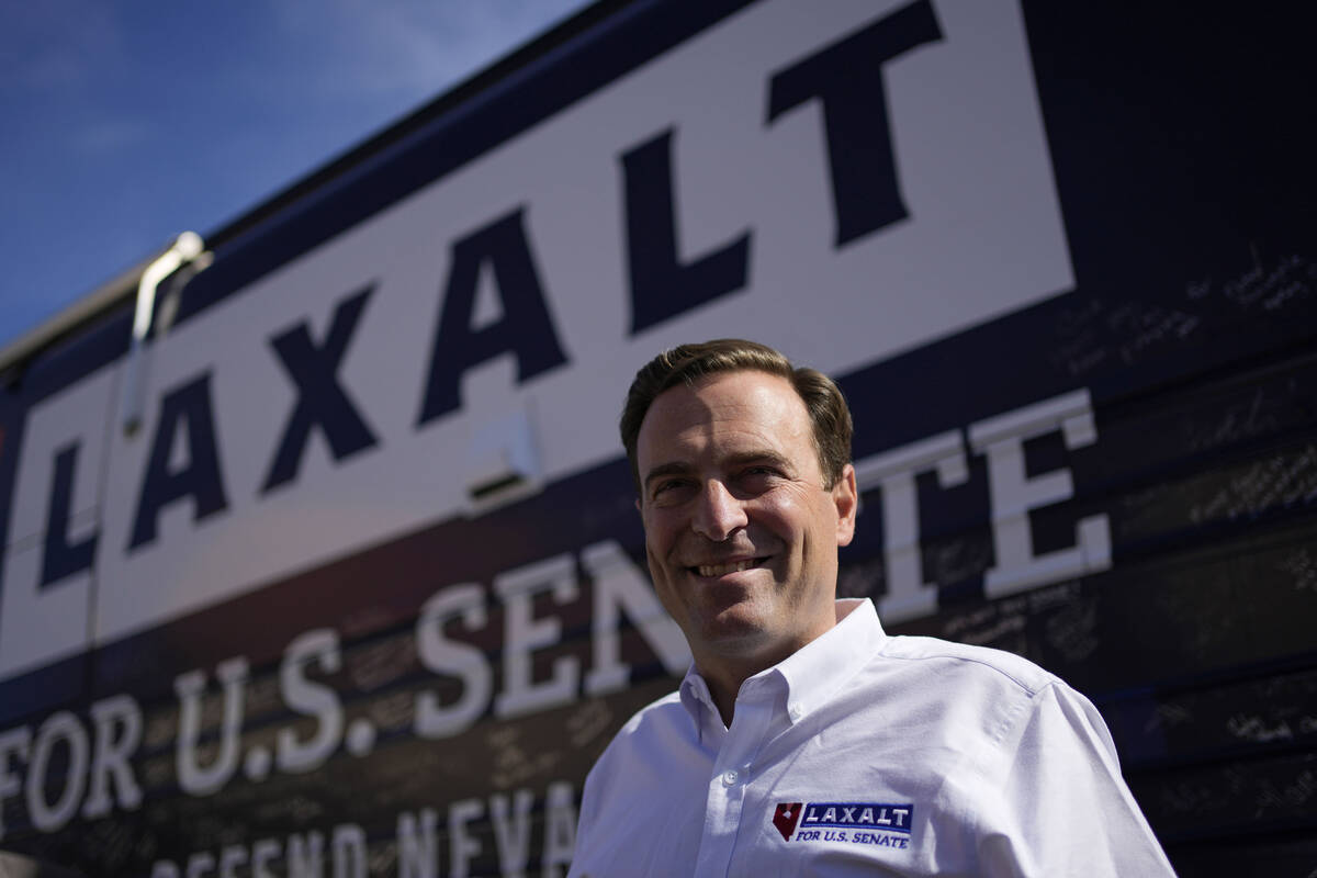Nevada Republican Senate candidate Adam Laxalt meets with supporters at a campaign stop Saturda ...