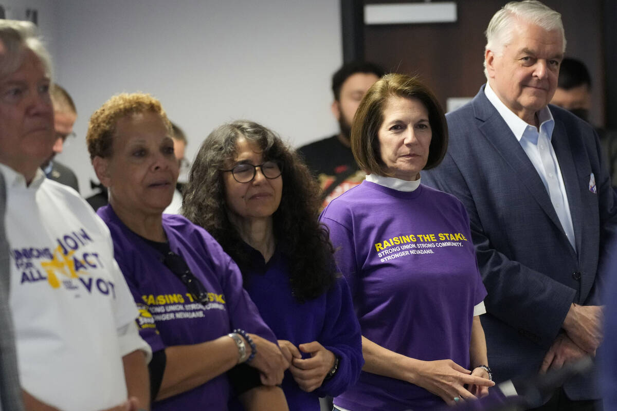 Sen. Catherine Cortez Masto, D-Nev., second from right, and Nevada Gov. Steve Sisolak, right, a ...