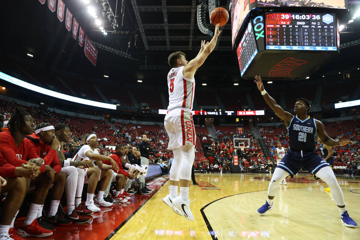 UNLV Rebels guard Jordan McCabe (5) takes a shot over Southern University Jaguars forward Festu ...