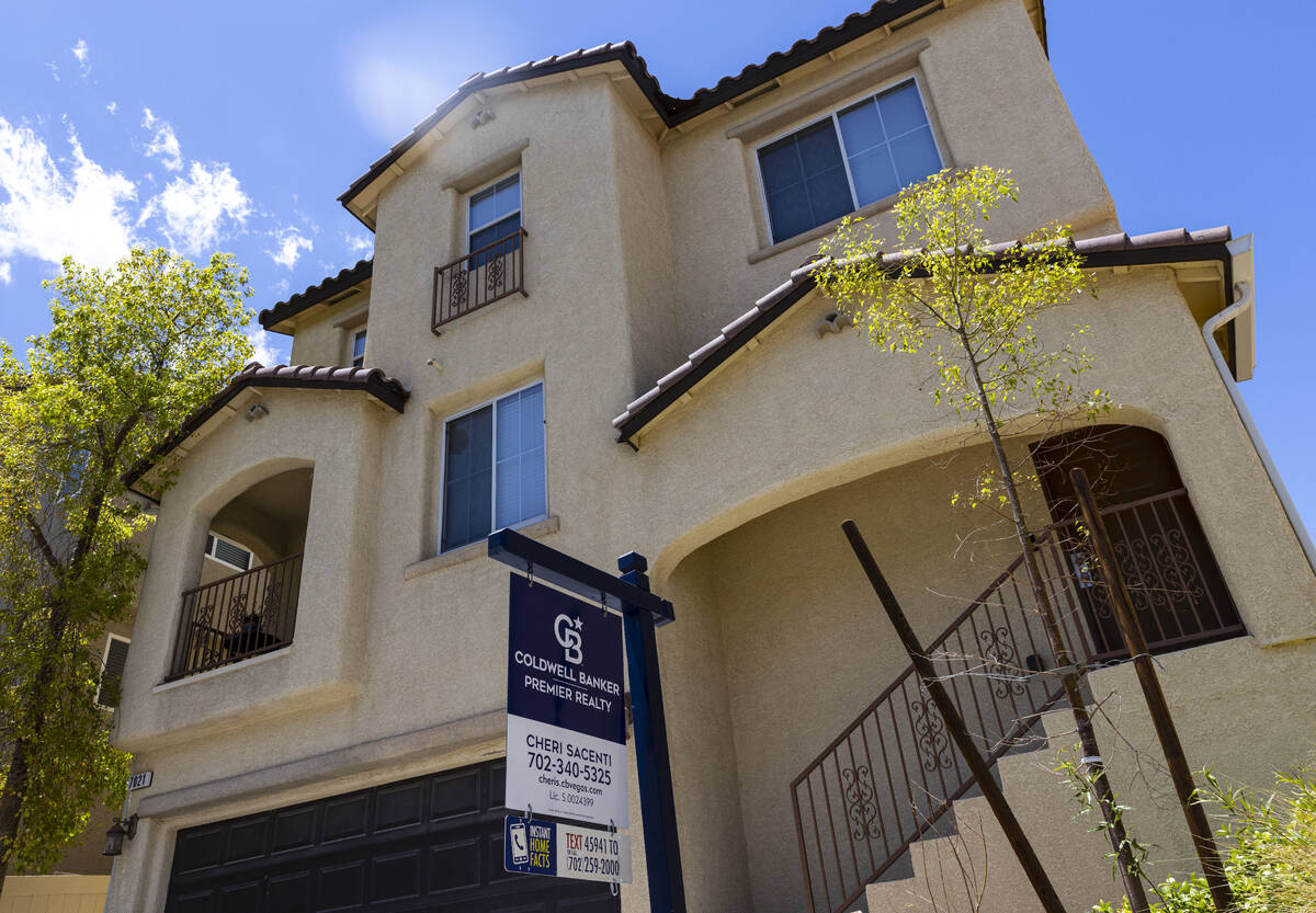 A for sale sign is posted in front of a single family house at Beverly Anne Street on Monday, J ...