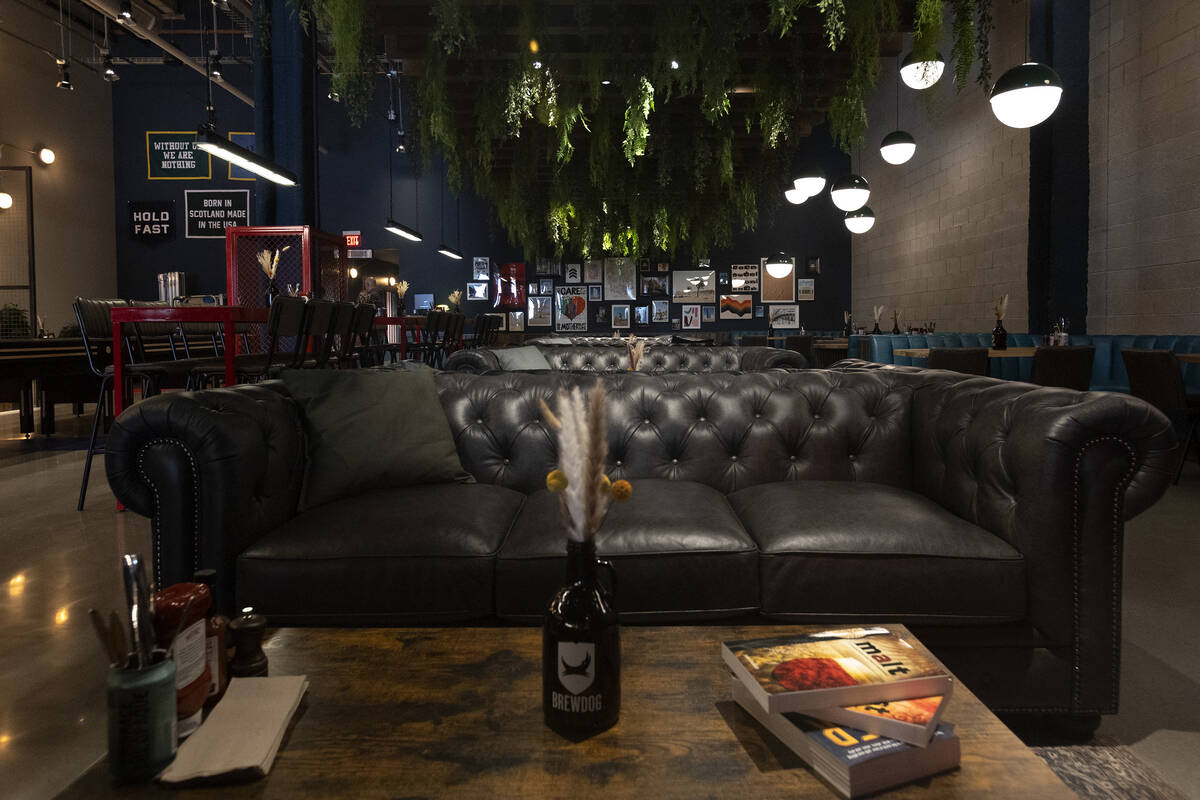 The inside of the new BrewDog atop Showcase Mall includes shuffleboard tables and communal seat ...