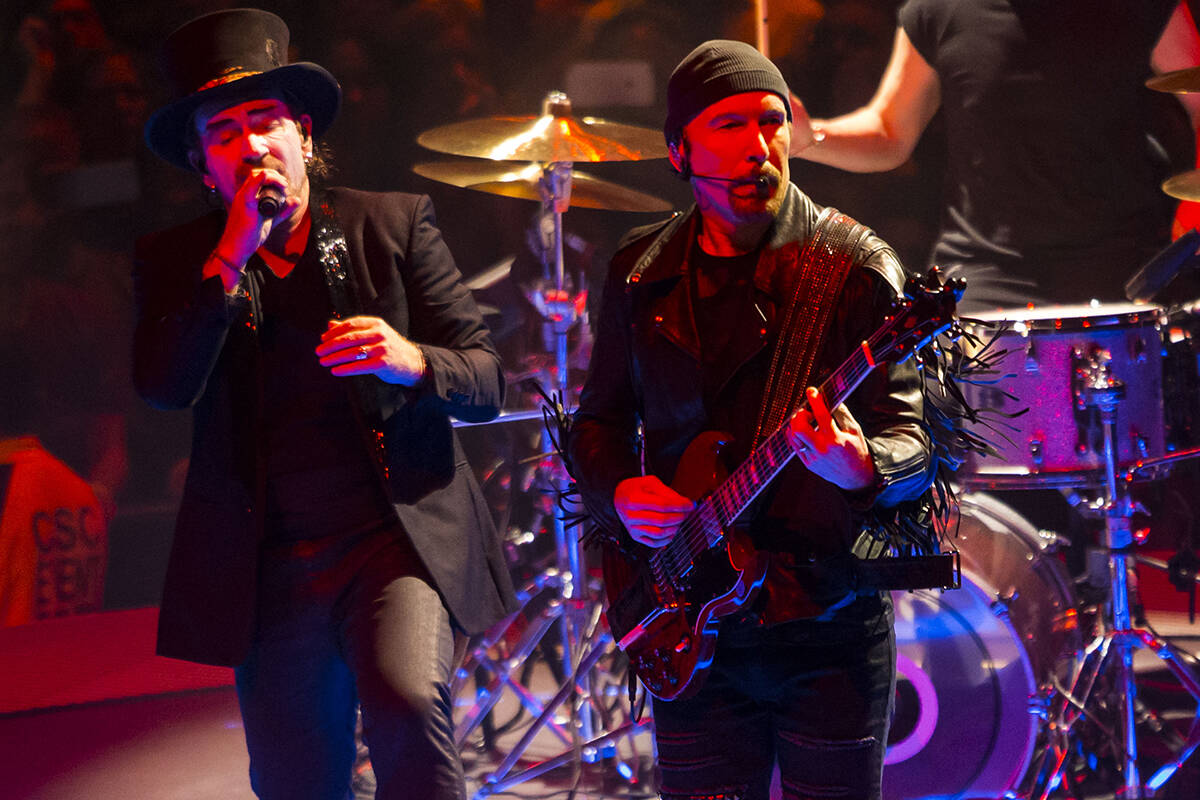 Bono, left, and The Edge of U2 perform at T-Mobile Arena in Las Vegas in May 2018. (Chase Steve ...