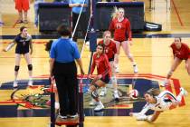 Coronado's Mia Arambula (1) dives to make a save against Shadow Ridge during a volleyball game ...