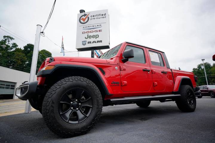 File - A used 2020 Jeep is on display on a lot in Pittsburgh, Thursday, Sept. 29, 2022. Price i ...