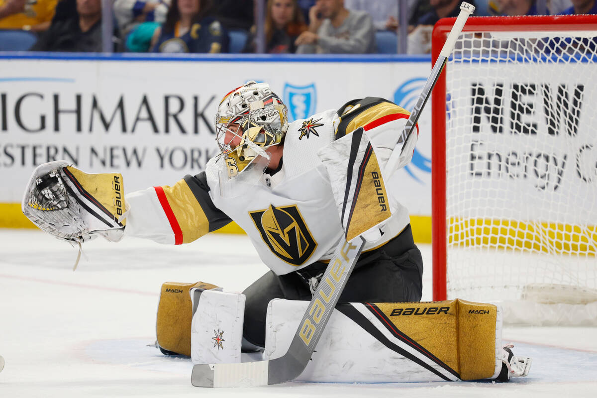 Vegas Golden Knights goaltender Logan Thompson makes a glove save during the first period of th ...