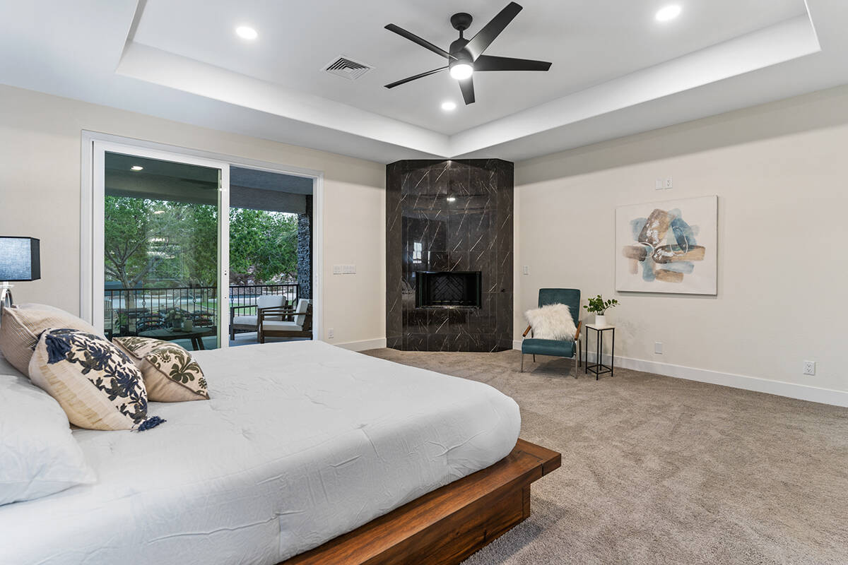 The master bedroom opens to the patio. (Sotheby’s International Realty)