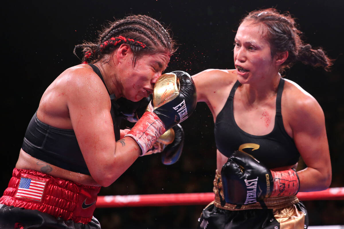 Seniesa Estrada, right, connects a punch against Marlen Esparza during the ninth round of the N ...