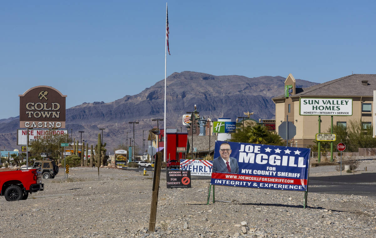 Election signs continue to be displayed along SR 160 as Nye County resumes hand counting ballot ...