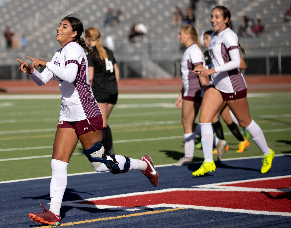 Faith Lutheran’s Andrea Leyva, left, runs to celebrate after scoring a goal against Gale ...