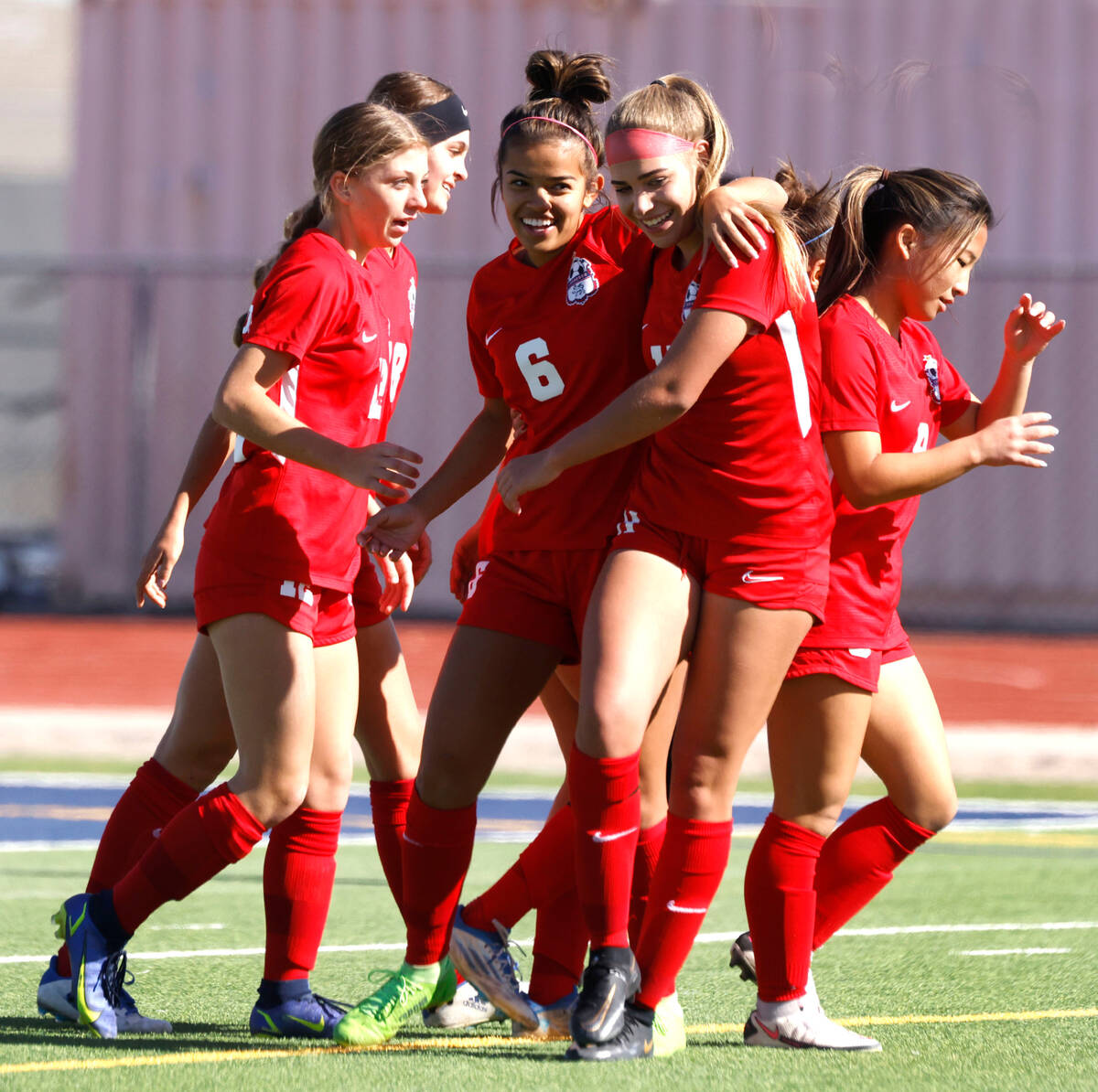 Coronado High's Tia Garr, left, celebrates her goal with her teammates during the second half o ...