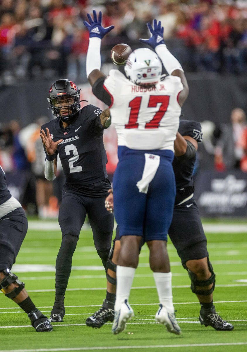 UNLV Rebels quarterback Doug Brumfield (2) throws the ball through the hands of Fresno State Bu ...