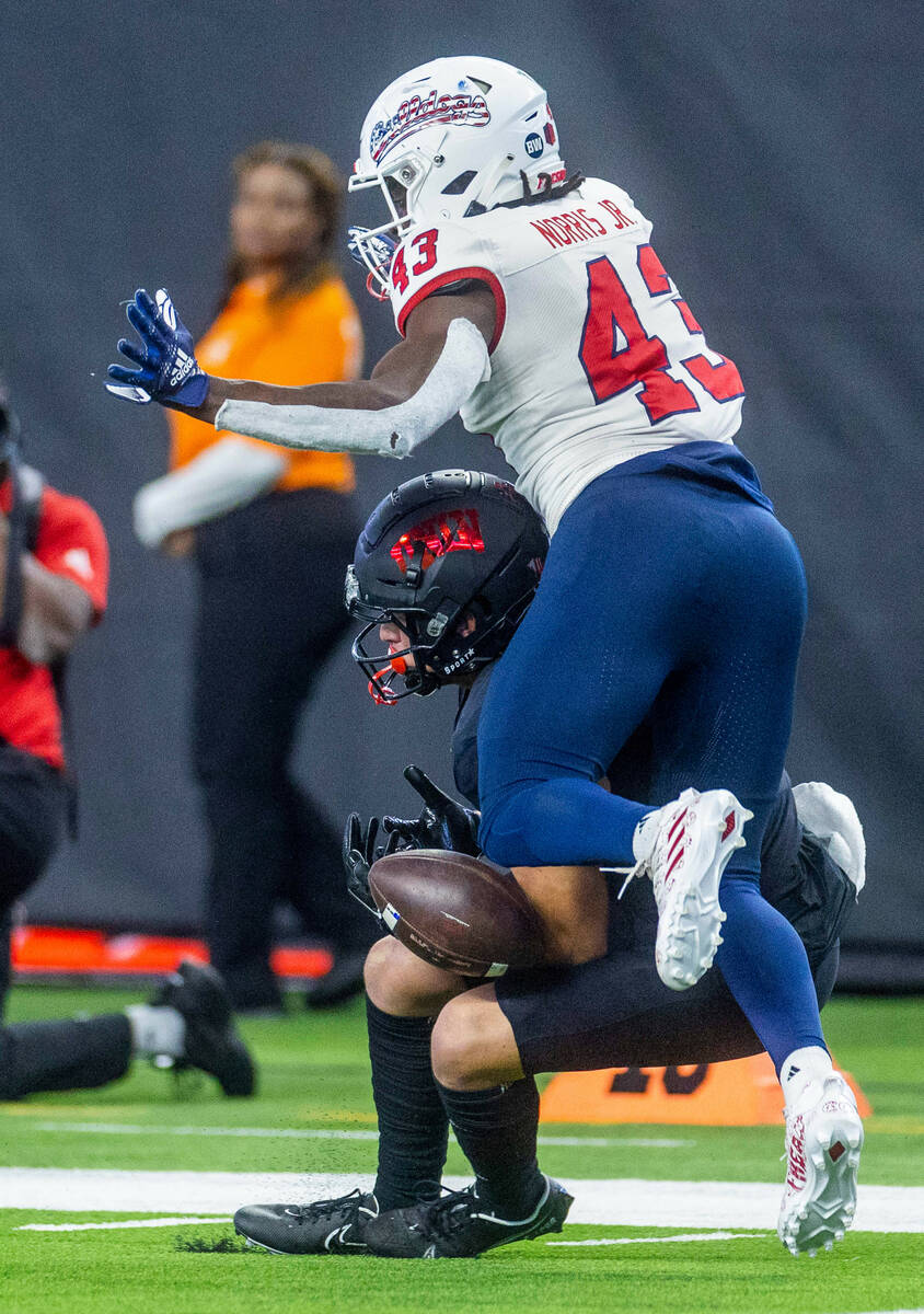 UNLV Rebels wide receiver Jeff Weimer (6) is interfered with by Fresno State Bulldogs defensive ...