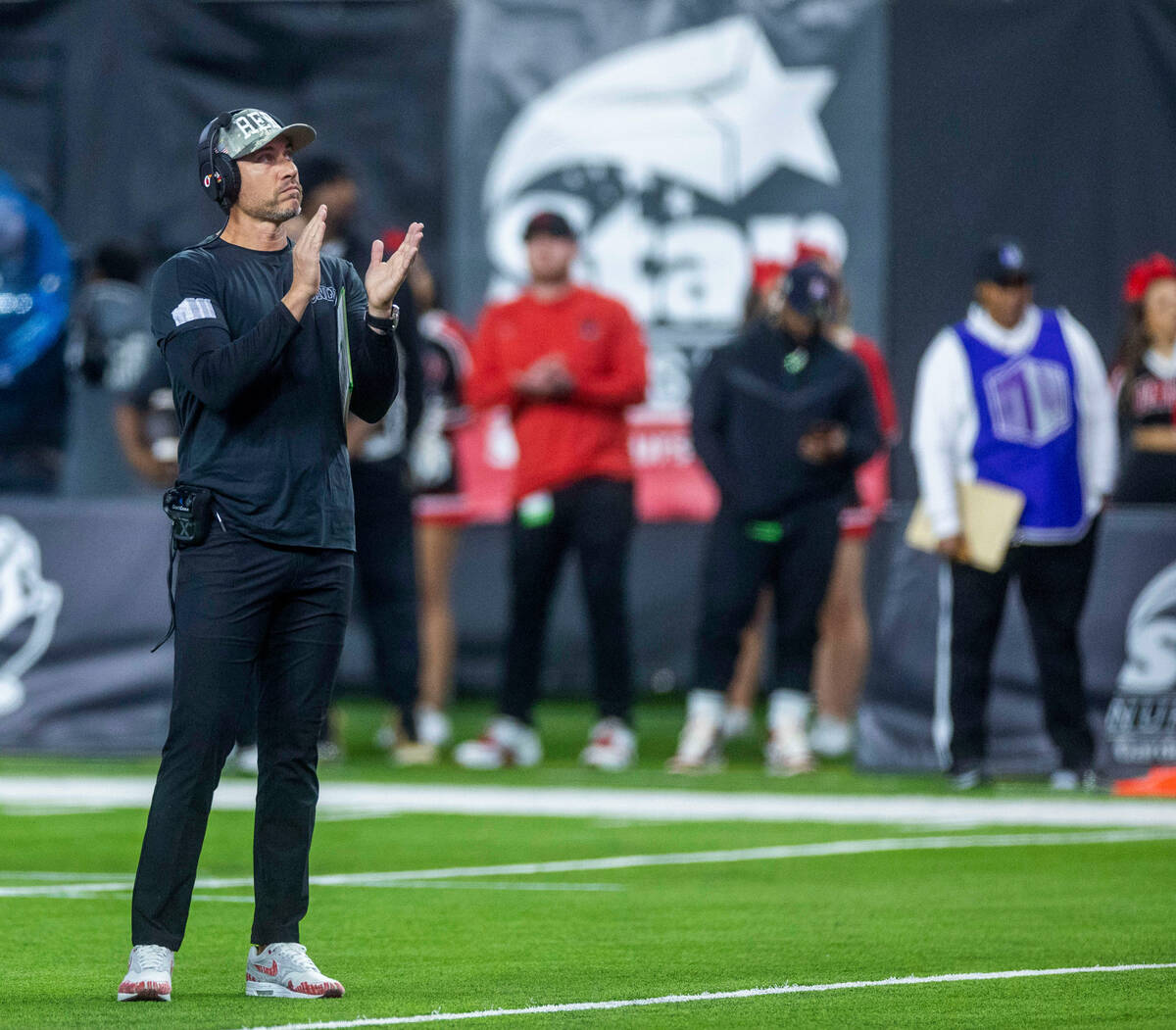 UNLV Rebels Head Coach Marcus Arroyo applauds on the sidelines versus the Fresno State Bulldogs ...