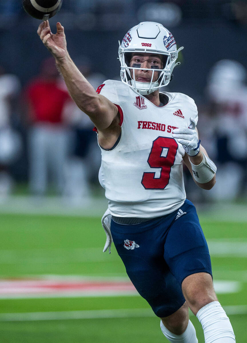 Fresno State Bulldogs quarterback Jake Haener (9) slings another pass versus the UNLV Rebels du ...