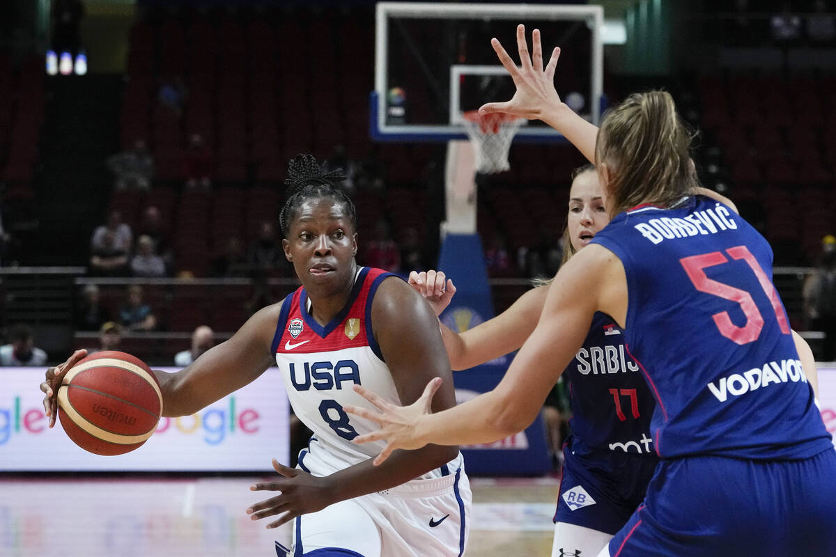 United States' Chelsea Gray runs at Serbia's Mina Dordevic during their quarterfinal game at th ...