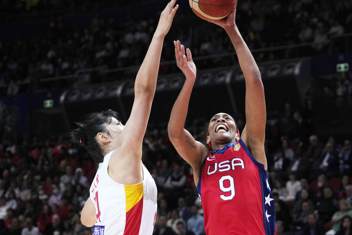 United States' A'ja Wilson, right, shoots over China's Li Yueru during their gold medal game at ...