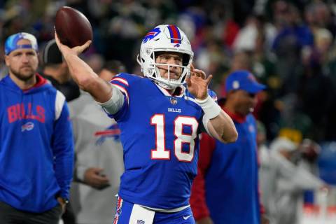 Buffalo Bills quarterback Case Keenum (18) warms up before an NFL football game against the Gre ...