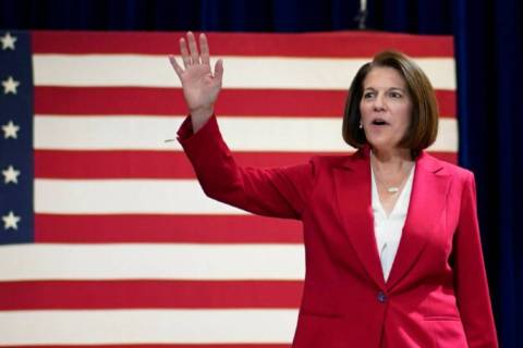Sen. Catherine Cortez Masto, D-Nev., walks on stage during a rally with former President Barack ...