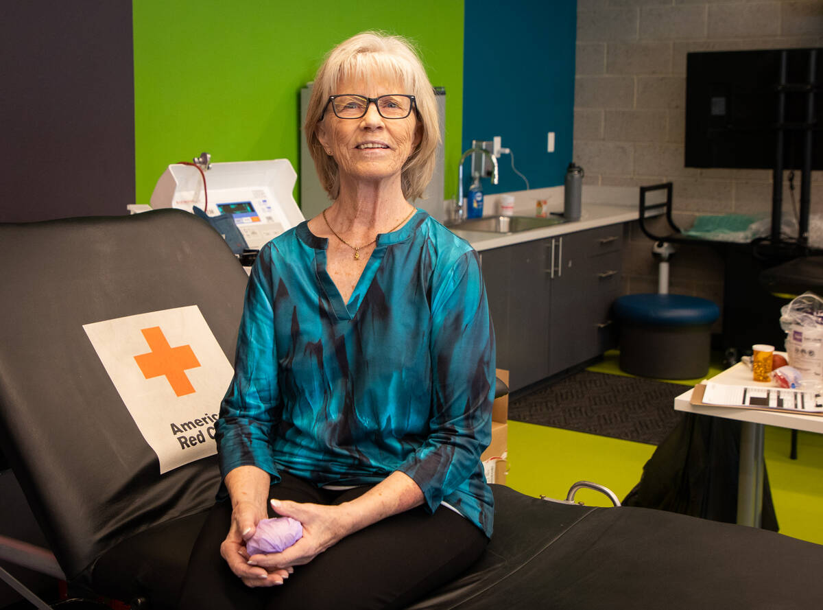 Sue Cox-Pyatt, 73, poses for a portrait at an American Red Cross blood drive at Mesquite Librar ...