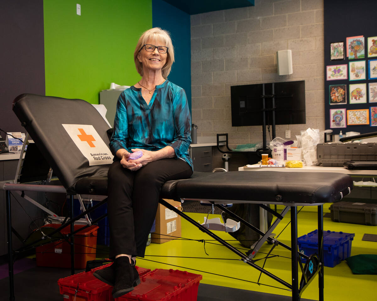Sue Cox-Pyatt, 73, poses for a portrait at an American Red Cross blood drive at Mesquite Librar ...