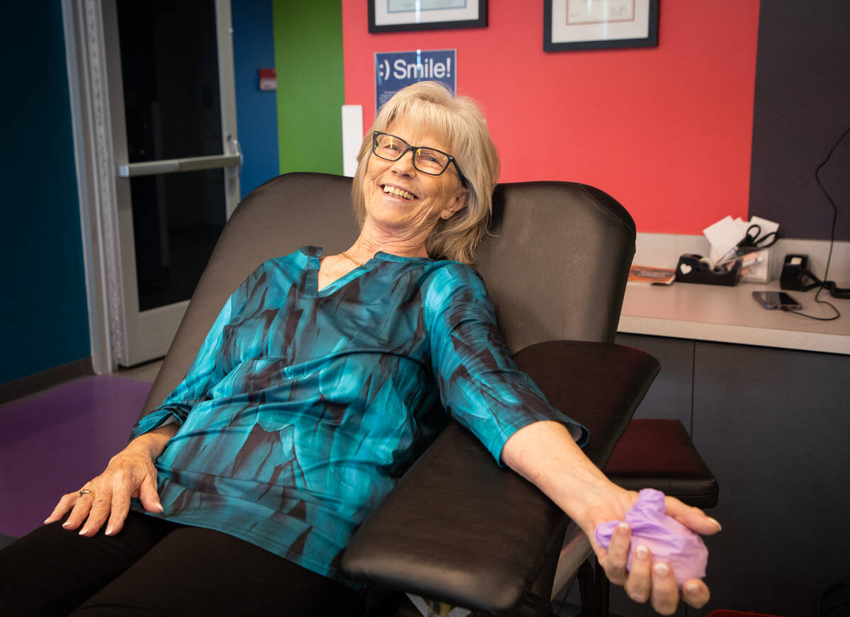 Sue Cox-Pyatt, 73, poses for a portrait at an American Red Cross blood drive at Mesquite Librar ...