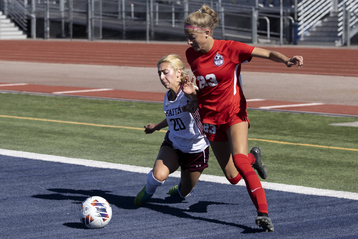 Faith Lutheran’s Ava Gardner (20) dives to defend against Coronado’s Daphne Egelh ...