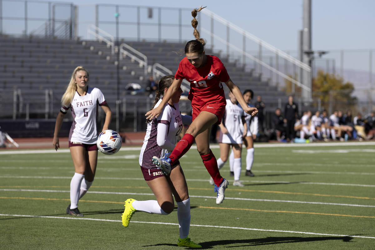 Coronado’s Trinity Buchanan (18) attempts a goal with a header next to Faith Lutheran&#x ...