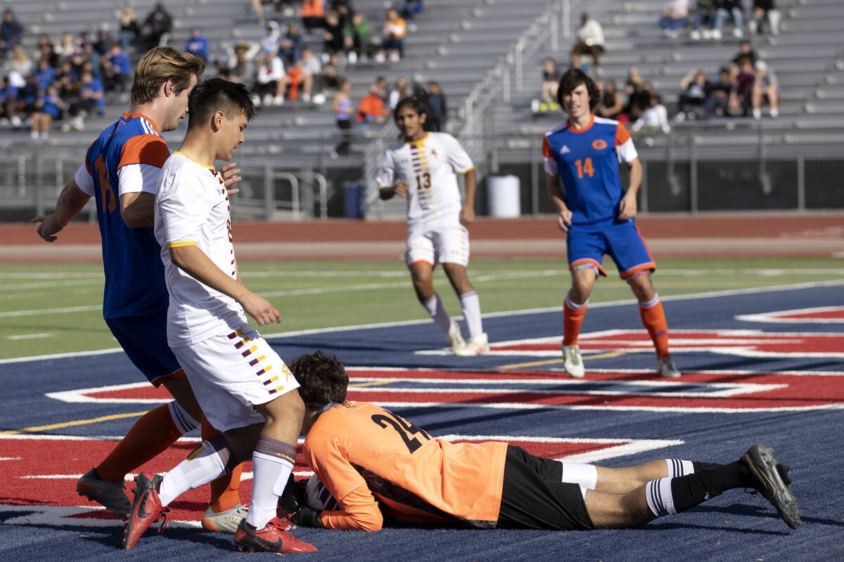 Bishop Gorman goalkeeper Devon Hume (24) makes a save against Eldorado during a Class 5A boys h ...