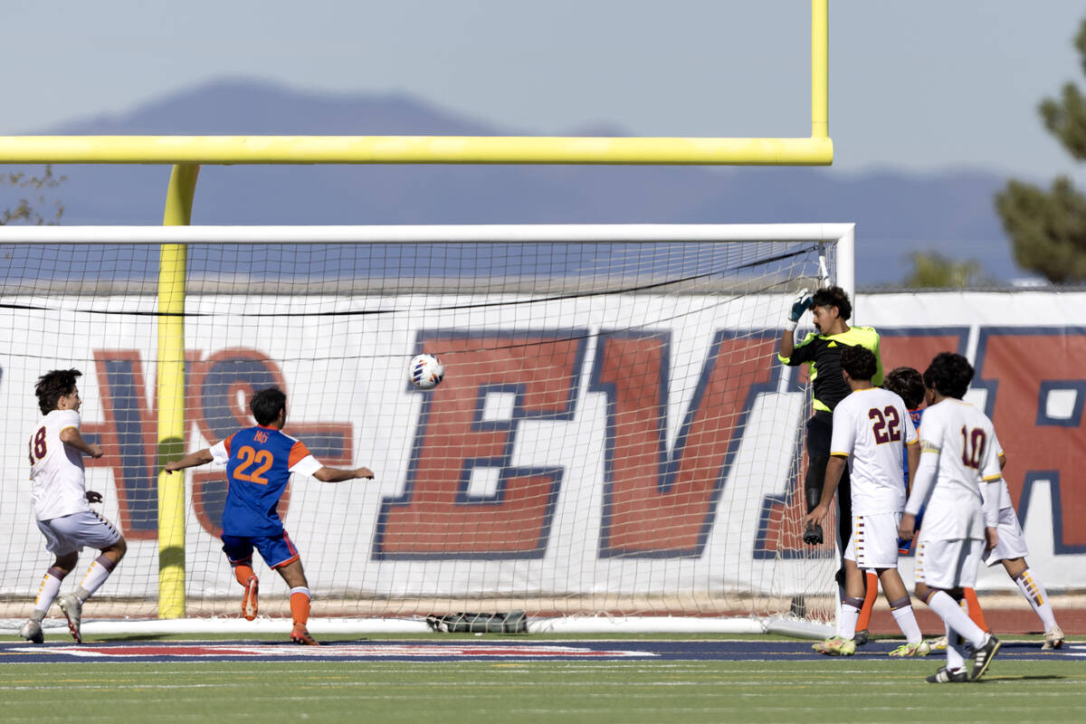 Bishop Gorman’s Jordan Menor (22) scores while Eldorado goalkeeper Jose Barriga misses t ...