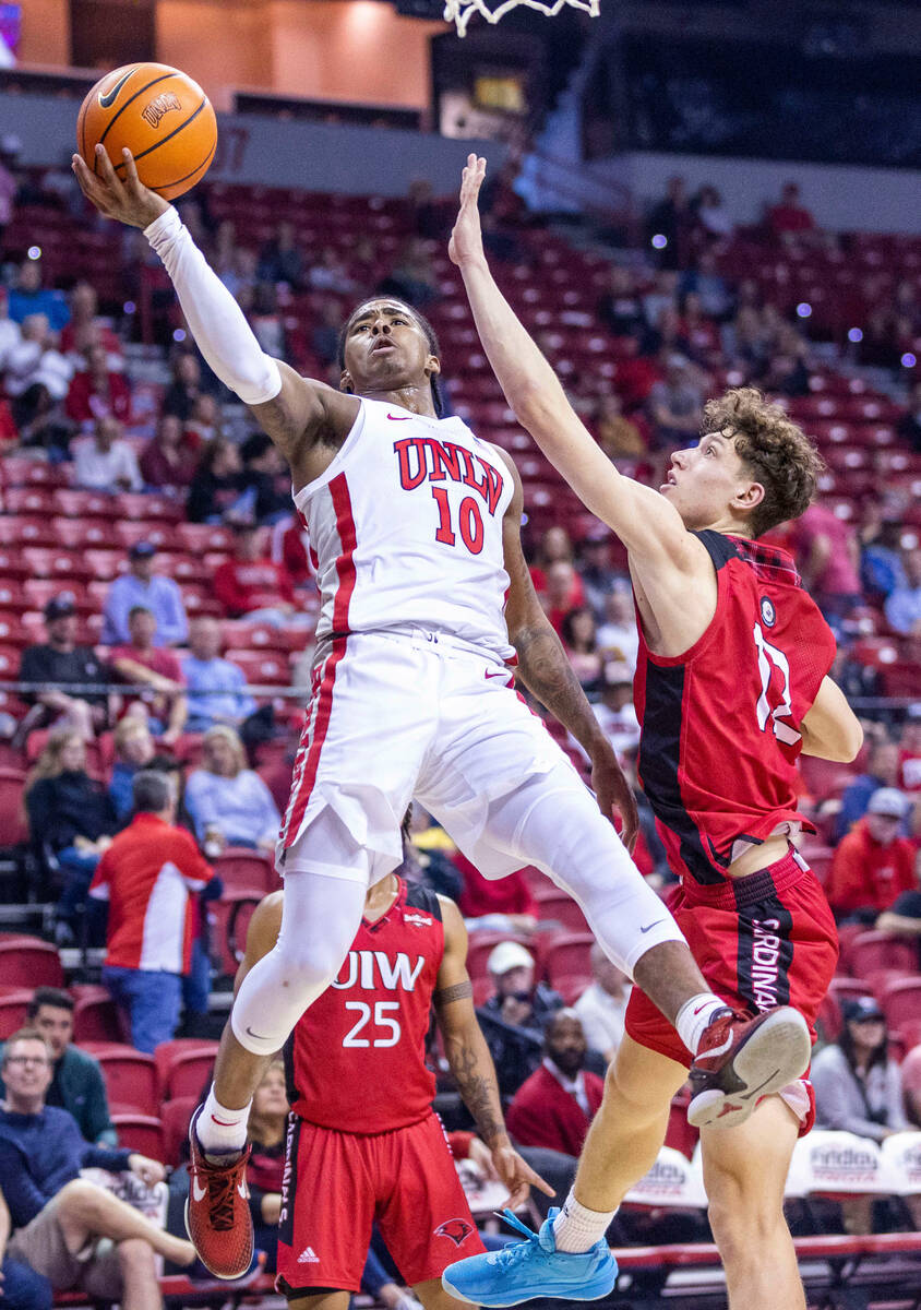 UNLV Rebels guard Keshon Gilbert (10) elevates for a basket around Incarnate Word Cardinals gua ...