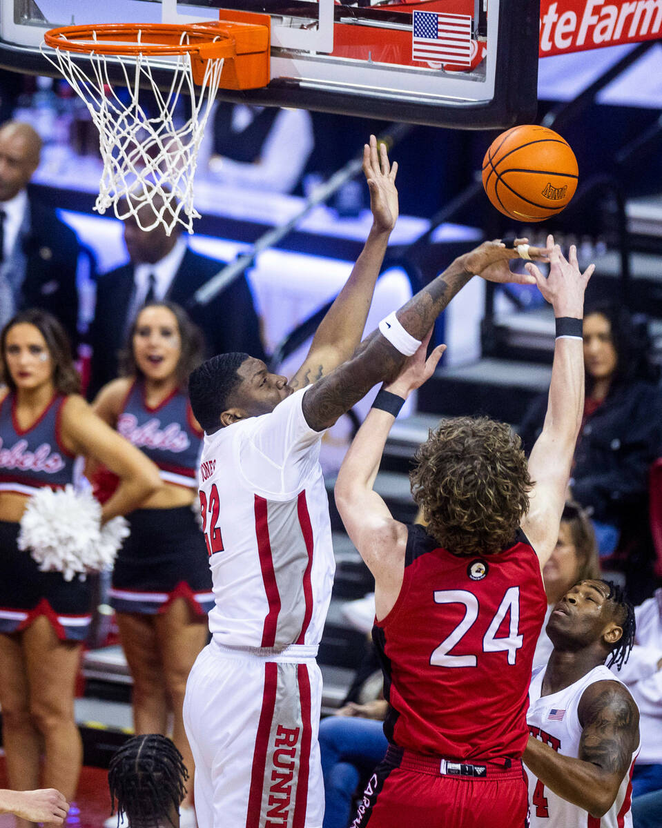 UNLV Rebels forward Karl Jones (22) rejects a shot by Incarnate Word Cardinals forward Benjamin ...