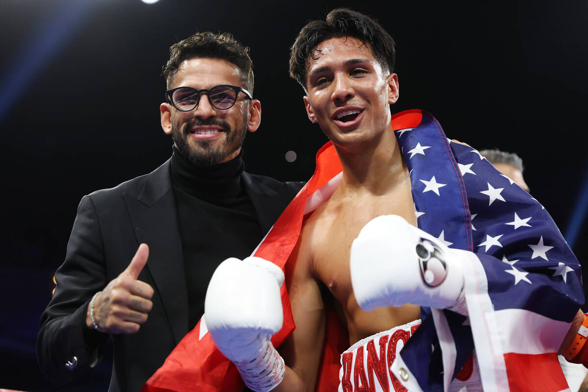 Emiliano Fernando Vargas, right, with Jorge Linares, celebrates his knockout win against Julio ...