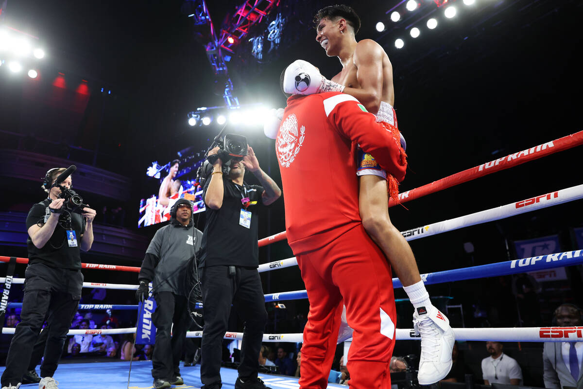 Emiliano Fernando Vargas, right, with his father Fernando Vargas, celebrates his knockout win a ...