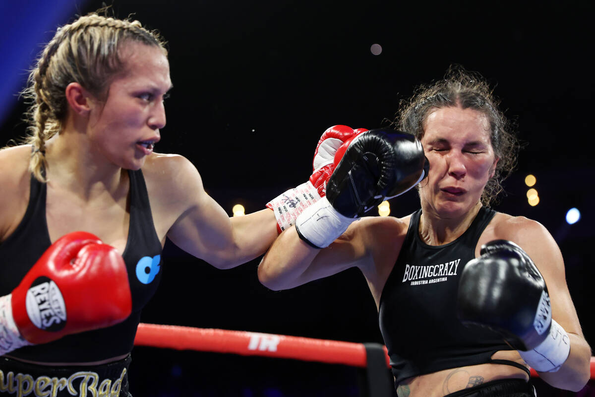 Seniesa Estrada, left, lands a punch against Jazmin Gala Villarino in the sixth round of the WB ...