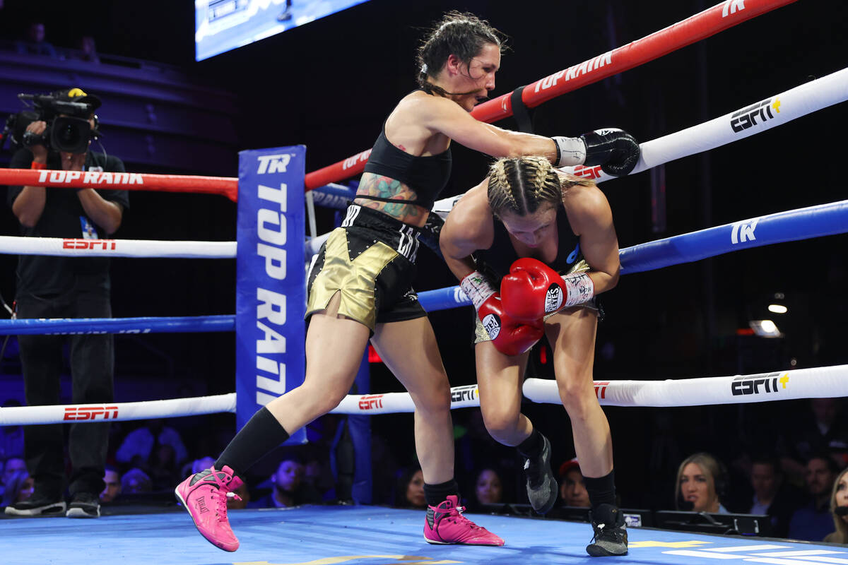 Seniesa Estrada, right, dodges a punch from Jazmin Gala Villarino in the ninth round of the WBA ...