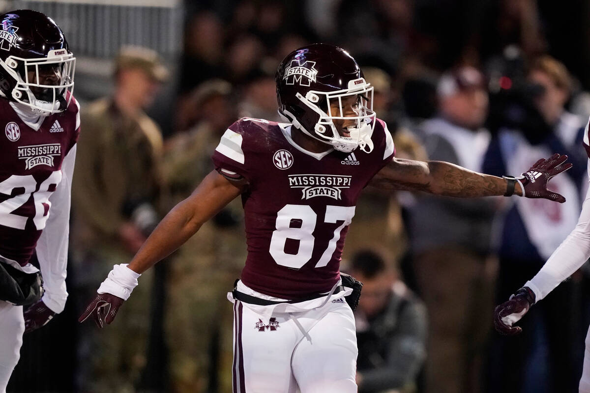 Mississippi State wide receiver Zavion Thomas (87) celebrates his return of a punt 63-yards for ...